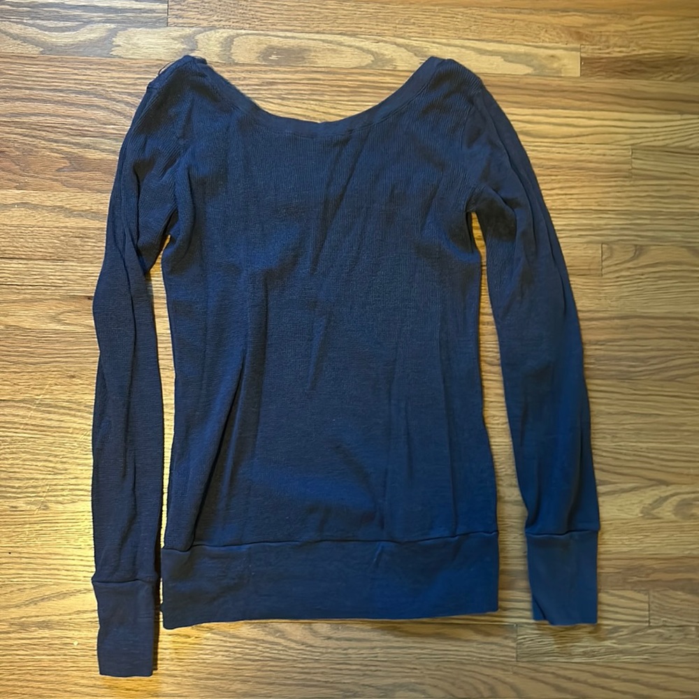 Waffle knit top with scoop back. Heathered navy.